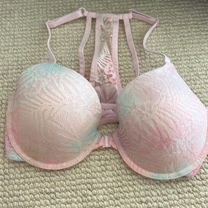 Victoria Secret, size 32DD, lightly lined, and a pink ombré color with lace